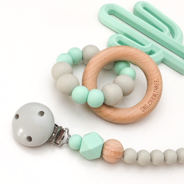 SCANDI Monogram Silicone Dummy Holder - Accessories - ONE.CHEW.THREE Boutique teething, modern accessories